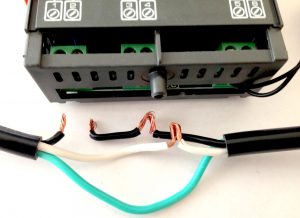 The leads aligning to terminal blocks